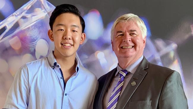 Somerset College student Kevin Song with Headmaster Craig Bassingthwaighte.