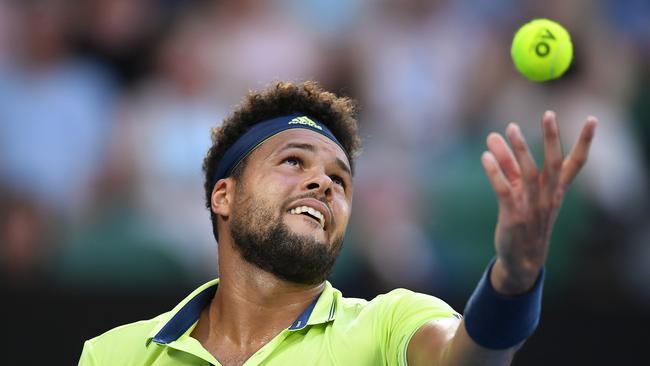 Jo-Wilfried Tsonga of France in action against Nick Kyrgios of Australia during round three on day five of the Australian Open. Photo: AAP