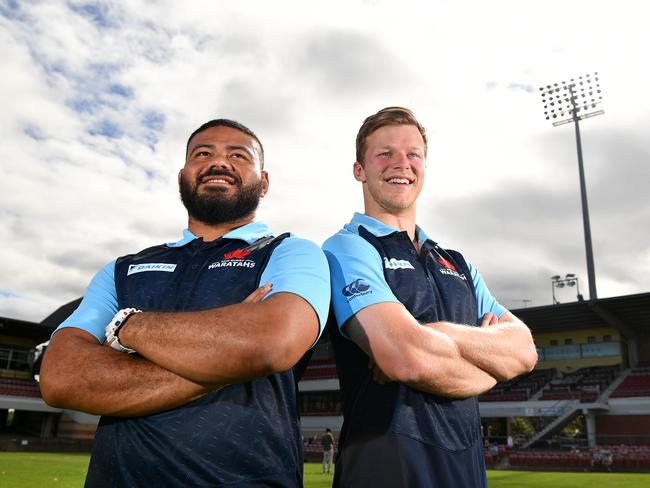 NSW Waratahs players Tolu Latu (left) and Cameron Clark pose for a photo at Brookvale Oval, Sydney, Tuesday, Dec. 5, 2017. The Waratahs are set to play a trial match at the venue. (AAP Image/Joel Carrett)