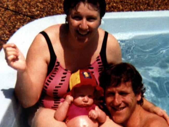 Kathleen Folbigg, pictured with former husband Craig and daughter Laura, who died in 1999, has hopes pinned on a petition to the NSW Governor.