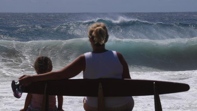 Large surf is seen at Snapper Rocks on the Gold Coast, Thursday, February 21, 2019. Huge swells and high tides are set to pummelling south-east Queensland and far-northern New South Wales beaches over the coming days as Cyclone Oma tracks towards the Queensland coast. (AAP Image/Dave Hunt) NO ARCHIVING