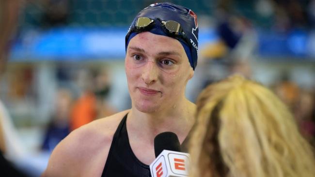 Lia Thomas of the University of Pennsylvania talks to a reporter after winning the 400m freestyle at the NCAA Division I Women's Swimming & Diving Championship in Atlanta.