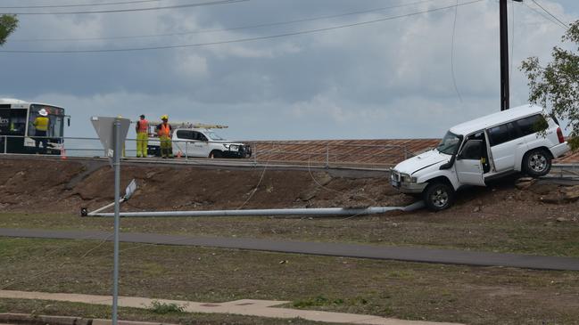 A driver went through a barrier on Daly St, knocking down a power pole in its path. Picture: Raphaella Saroukos