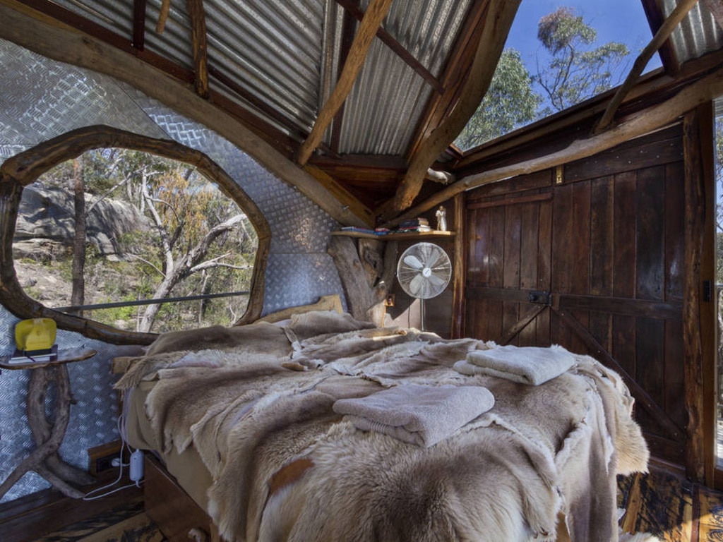 The cosy treehouse is nestled between National Parks and World Heritage listed rainforest. Picture: Airbnb