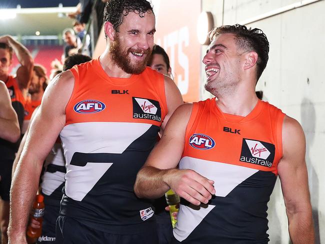 Giants Shane Mumford and Stephen Coniglio after the GWS Giants had a huge win over Hawthorn at Spotless Stadium. Picture. Phil Hillyard