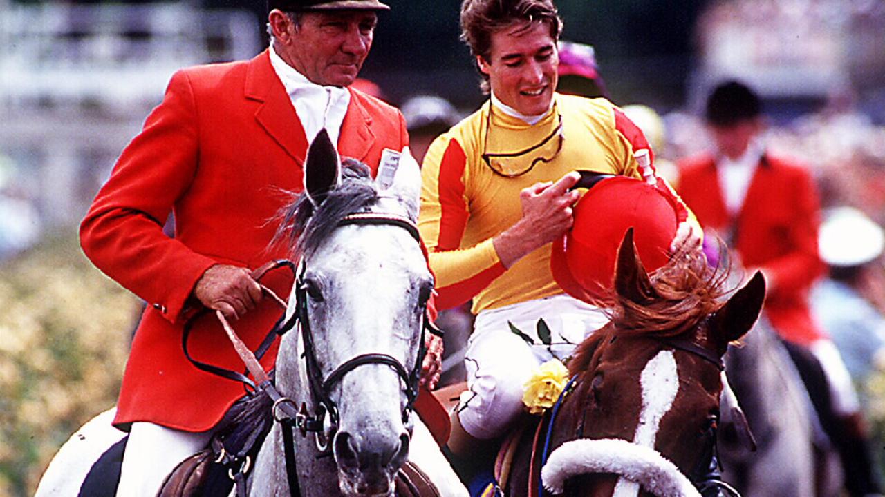 Jockey Darren Beadman returning on racehorse Kingston Rule after winning 1990 Melbourne Cup.   Sport / Turf