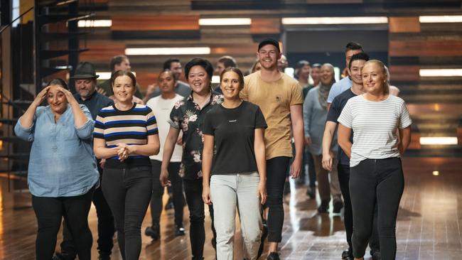 The 24 returning contestants arrive for the first day of MasterChef Australia, including Ungermann (in sky blue shirt). Picture: Tina Smigielski