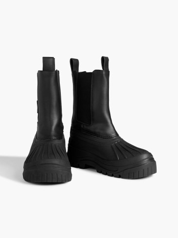 Axel Arigato Rain Boots. Picture: The Outnet.