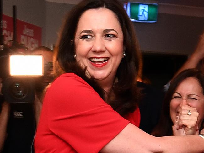 Queensland Premier Annastacia Palaszczuk is greeted by supporters as she arrives to an election night function at the Oxley Golf Club in Brisbane, Saturday, November 25, 2017. Queenslanders voted today in the state's election. (AAP Image/Dan Peled) NO ARCHIVING