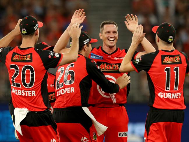 Chris Tremain (centre) of the Renegades finished with figures of 3-9. Picture: AAP Image.