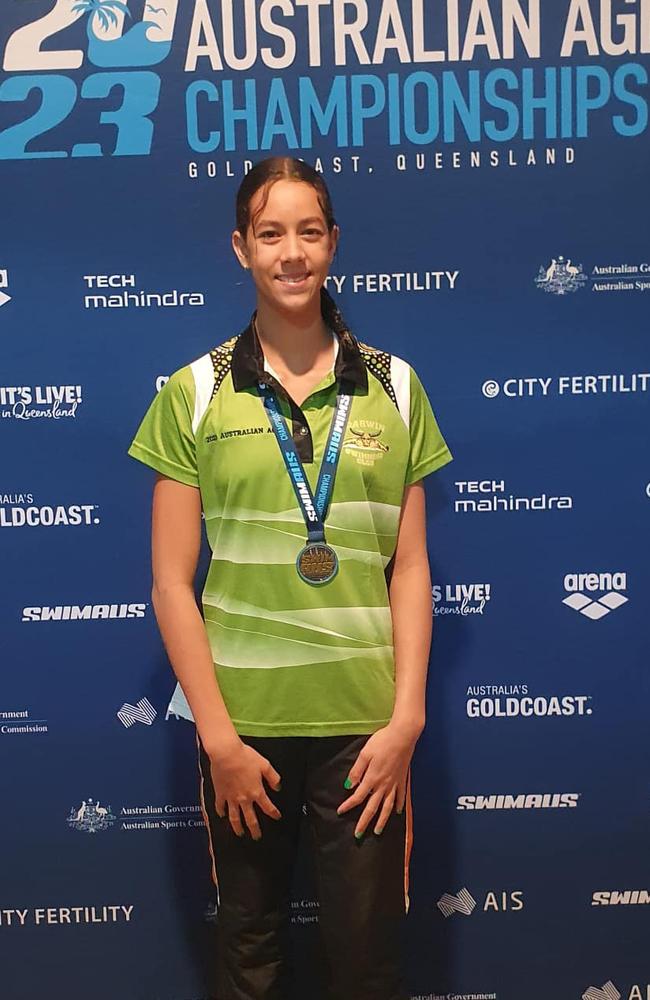 Territorian Macey Sheridan has shocked the country claiming five gold medals in the Australian Age Group Swimming Championships.