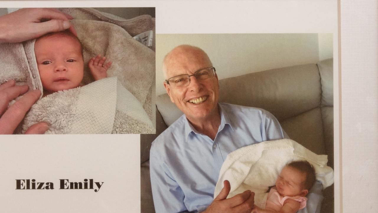 Erin’s dad Jim Molan holding Eliza for the first time