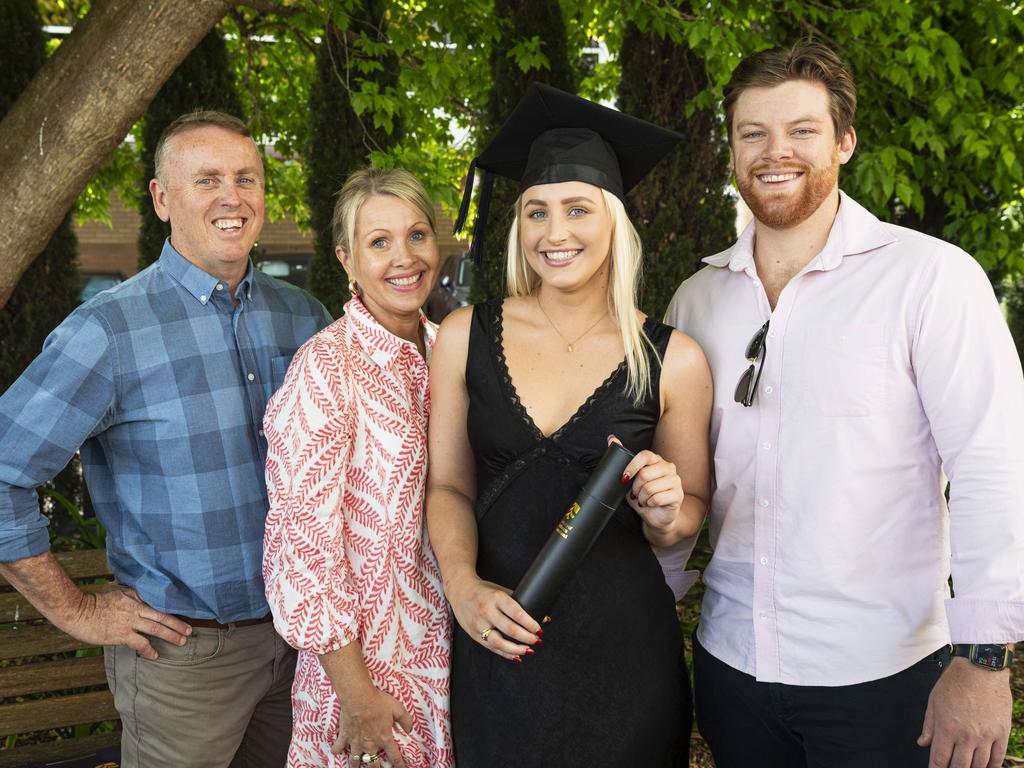 Associate Degree of Education graduate Georgia Marsh celebrates with (from left) Michael Marsh, Skye Marsh and Nick Thom at a UniSQ graduation ceremony at The Empire, Tuesday, October 29, 2024. Picture: Kevin Farmer