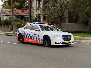 Picture of a police car on Weston St, Revesby responding to a police pursuit