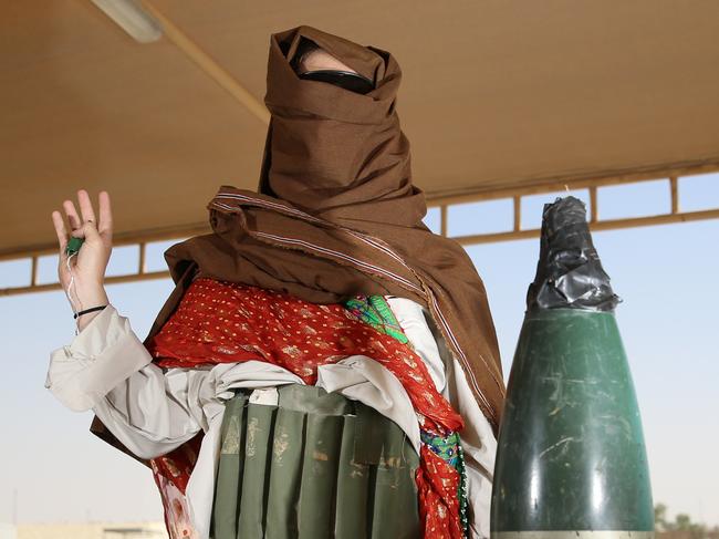 Job ID RAM0710201401. A demonstration of what the ADF personnel will face when they enter Iraq. A person wearing a suicide vest, packed with explosive devices, dressed as a local. The idea behind the demonstration is to the show the deploying ADF personnel of how hard it is to spot a potential threat. Pic by Gary Ramage.