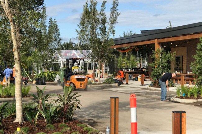 Workers putting the finishing touches on the Westfield Coomera at Coomera Town Centre