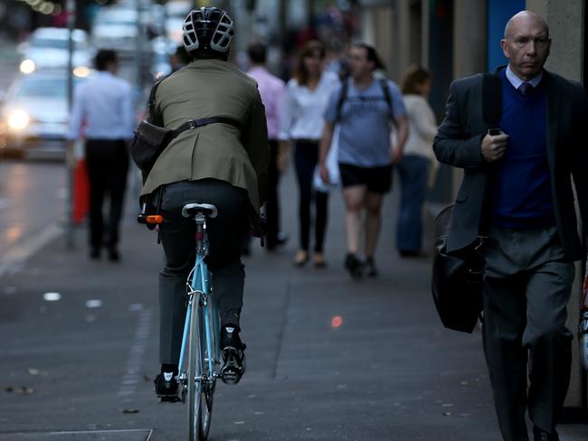 This cyclist gets a tick for wearing a helmet but unless he’s under 12 is in the wrong.