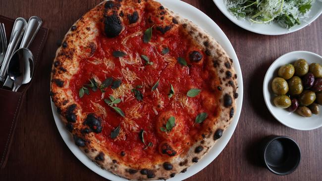 The tomato pizza with anchovies at Capitano, Carlton. Picture: Rebecca Michael.