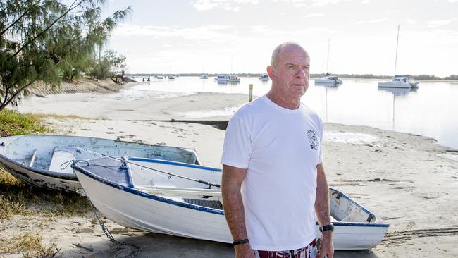 Gold Coast City Council has removed some of the iconic tinnies on the foreshore at Labrador. Boat owner Wayne Hayes has been able to keep his tinnie as it was on the sand not on the dune. Picture: Jerad Williams