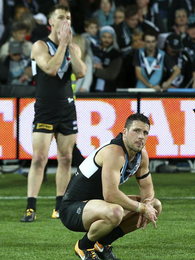 A shattered Robbie Gray, back, and captain Travis Boak, after the elimination final loss to West Coast and just days before his cancer diagnosis. Picture Sarah Reed