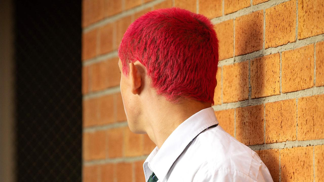 High school student booted from class for dyed hair