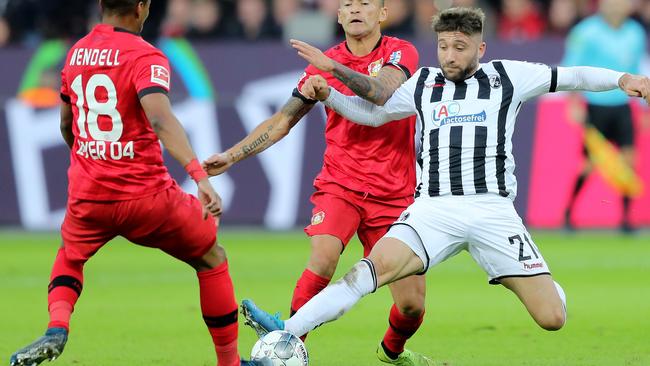 SA’s Brandon Borrello of Freiburg takes on Wendell of Bayer 04 Leverkusen at BayArena. (Photo by Christof Koepsel/Bongarts/Getty Images)