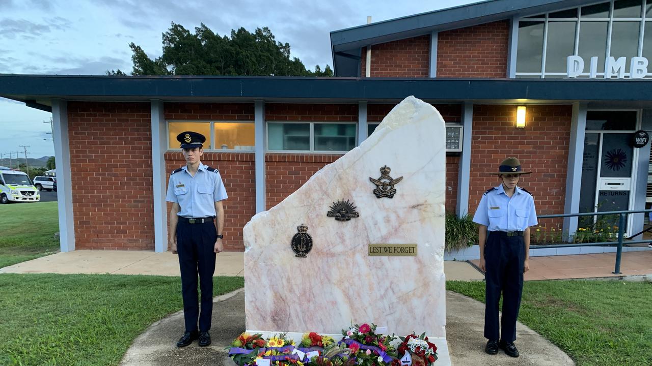 Cadet under officer William Robinson and cadet Jill McInnes at the Dimbulah cenotaph this morning. Picture: Supplied