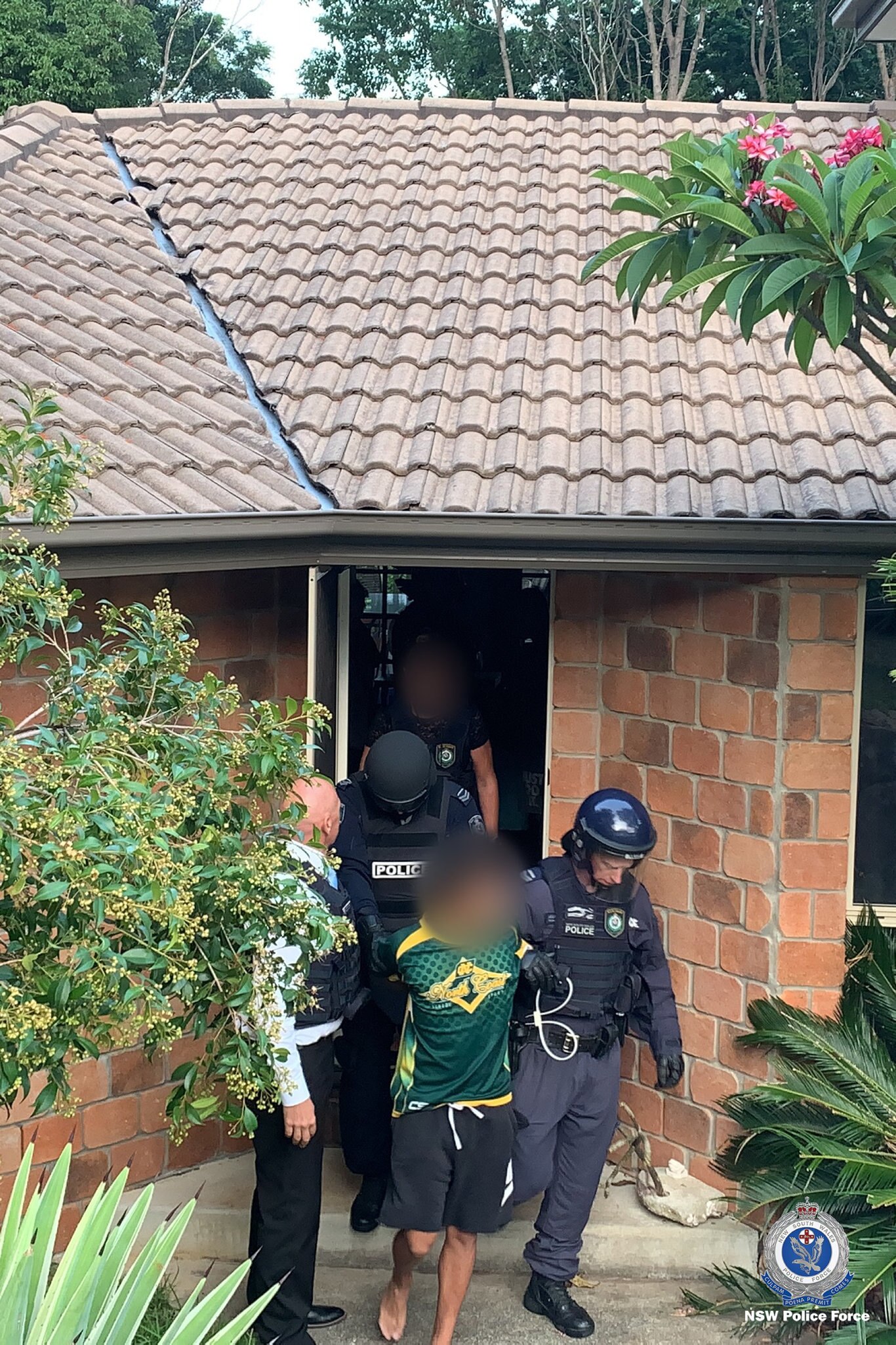 Police executed a search warrant at a home in Tweed Heads West and arrested an 18-year-old man, who was charged with murder following a fatal brawl at Ballina last month. Picture: NSW Police