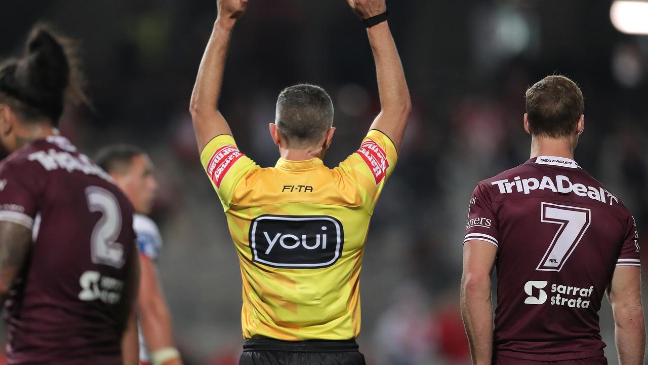 Referee Matt Cecchin sends Jorge Taufua of the Sea Eagles to the sin bin.