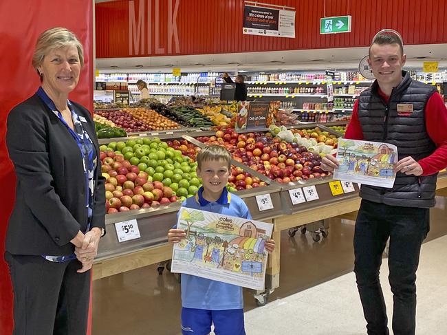 Kingscliff Public School principal Diana Foley, winning student Tommy Millar, 8, and Coles Casuarina store manager Mitch Springer.