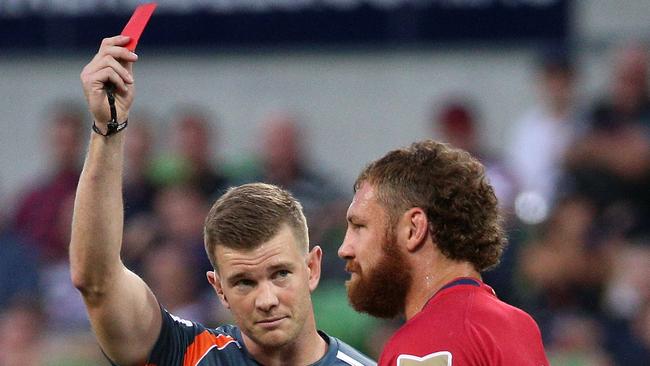 Reds captain Scott Higginbotham is shown a red card during the match against the Rebels at AAMI Park last Friday. Picture: AAP