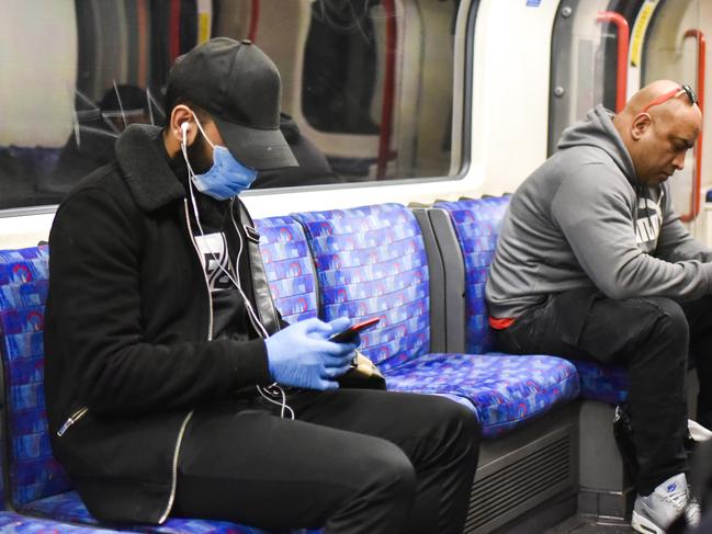 A man sits on a London underground train. Picture: AP