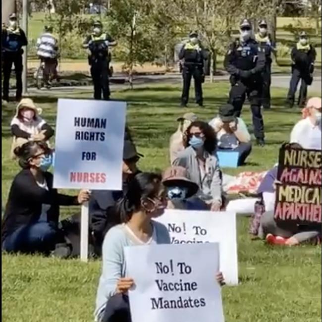 A silent protest against mandatory vaccination in Fitzroy on Monday. Picture: Paul Dowsley / Twitter