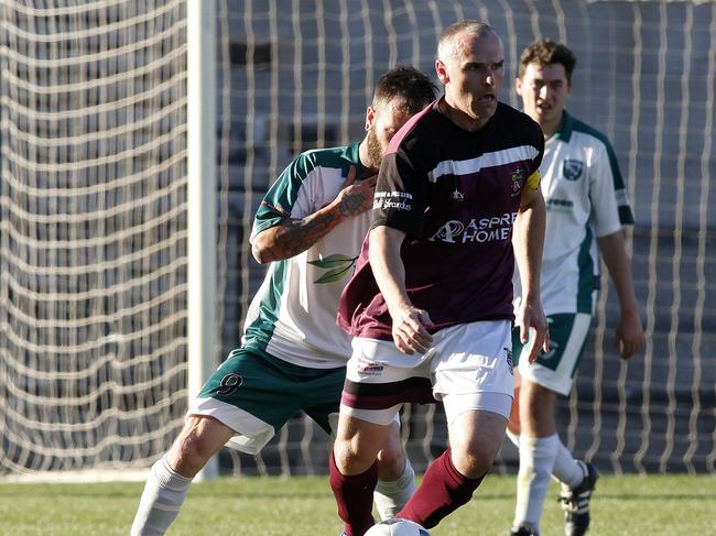 Elizabeth Downs coach Steve Hughes during his playing days for the club. Picture: Bianca De Marchi