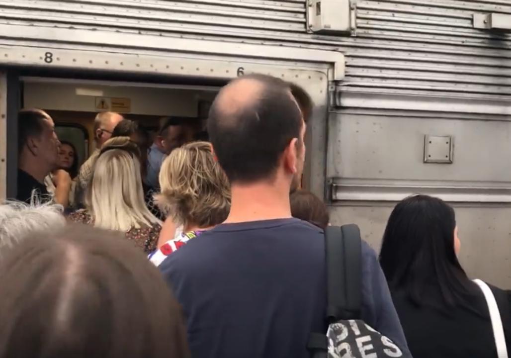 Commuters Unable to Enter Overcrowded Western Line Train. Credit - Jake McCallum/News Corp Australia via Storyful