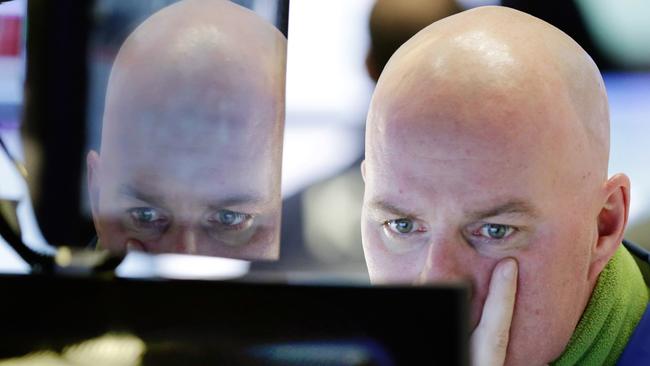 Specialist John O'Hara works at his post on the floor of the New York Stock Exchange, Thursday, Jan. 7, 2016. U.S. stocks are opening sharply lower as worries intensify about China's economy and dropping oil prices. (AP Photo/Richard Drew)