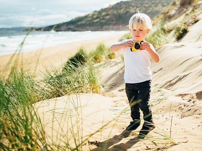 Like father, like son. Exploring South Arm in Tassie. Picture: Tim Coulson