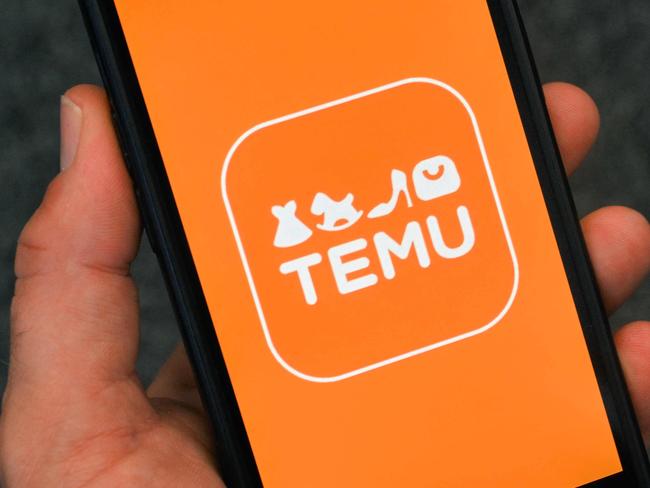 This photograph shows the logo of Chinese e-commerce company Temu displayed on a mobile phone, in Brussels, on November 4, 2024. (Photo by Nicolas TUCAT / AFP)