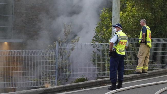 Northern Beaches Police helped firefighters evacuate about 40 people from the unit block as choking smoke entered units. Picture: News Corp