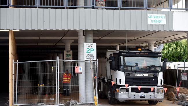 Construction inside the multi level carpark of a new travelator (escalator for people and shopping trolleys) near the Coles supermarket at Dorset Square, Boronia.