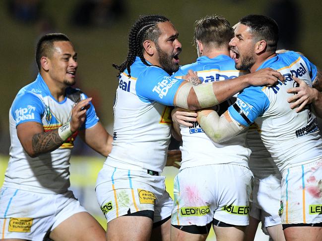 Titans players celebrate and AJ Brimson try during the Round 23 NRL match between the Manly-Warringah Sea Eagles and the Gold Coast Titans at Lottoland in Sydney, Friday, August 17, 2018. (AAP Image/Dan Himbrechts) NO ARCHIVING, EDITORIAL USE ONLY