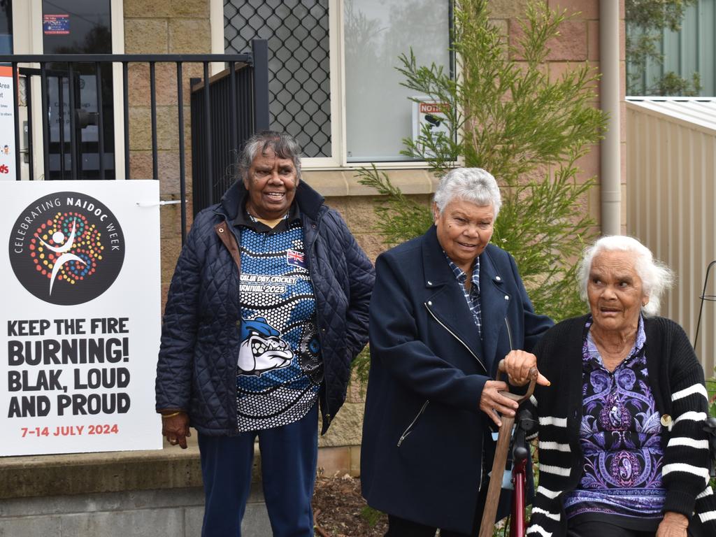 Elders June Speedy, Margaret Boney and Faye Hicks planting a lemon myrtle tree at NAIDOC Week, July 9, 2024.