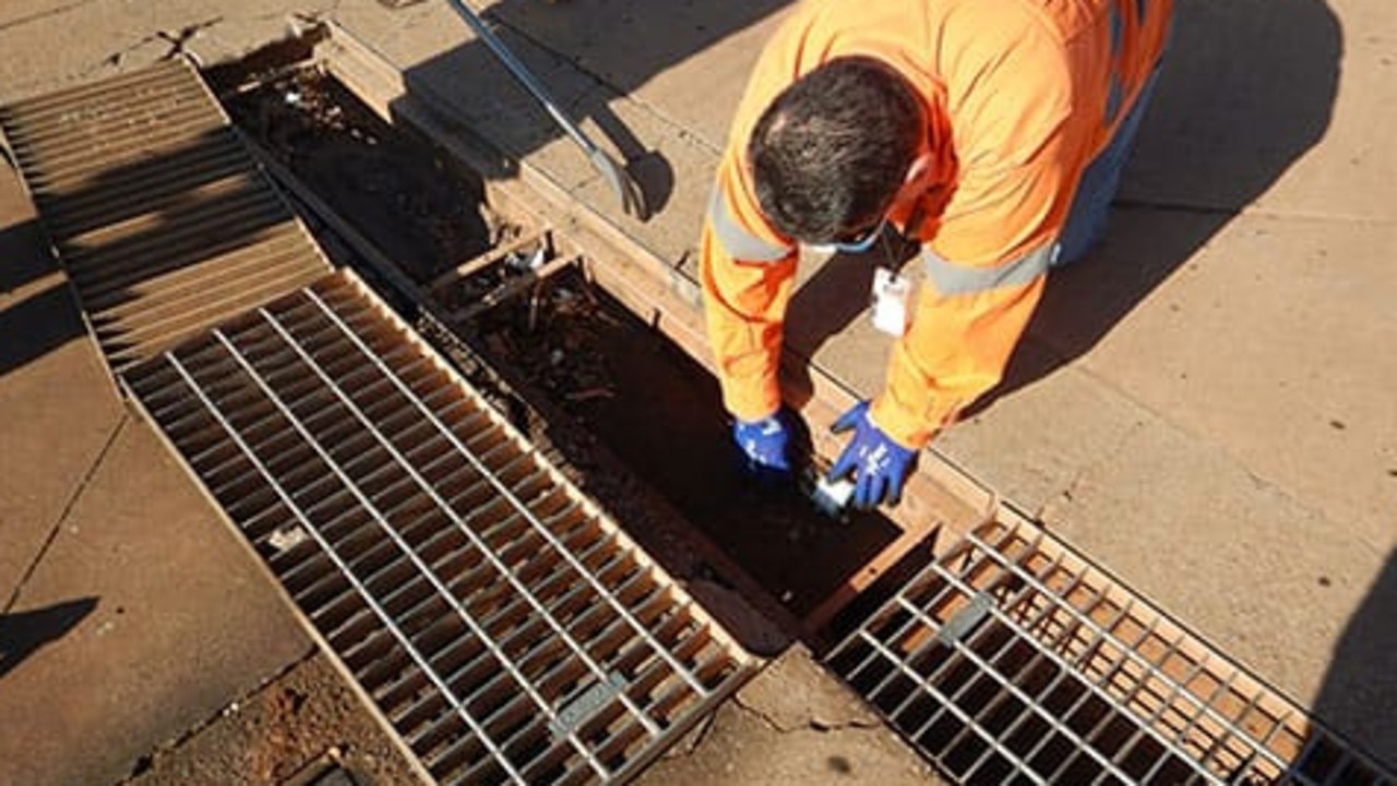 The NT EPA has issued more than $26,000 in fines for oil spills in Darwin. Officers sampled the downgradient outfall drain for hydrocarbons, collecting evidence used to confirm an offence. Pic: Supplied.