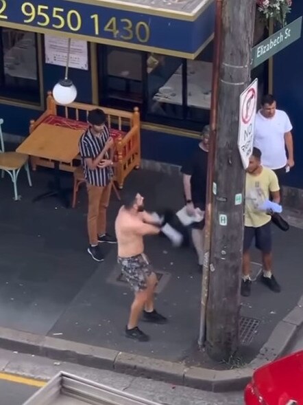 The man took off his singlet in a fit of rage, but the incident appeared to come to a nonviolent resolution. Picture: Facebook/ Humans of Bankstown