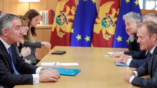 Montenegro's President Milo Djukanovic (L) and the President of the European Council Donald Tusk (R) in a meeting at the European Council. Picture: AFP. 