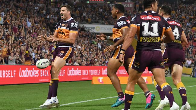 Corey Oates celebrates his first try. Picture: AAP Image/Dan Peled