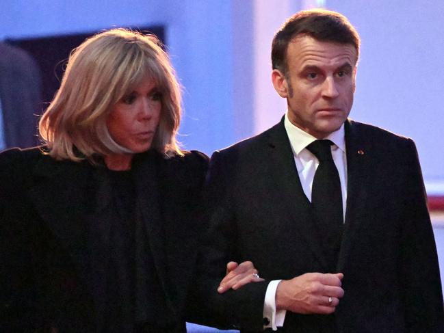 French President Emmanuel Macron and his wife Brigitte Macron at the ceremony. Picture: AFP