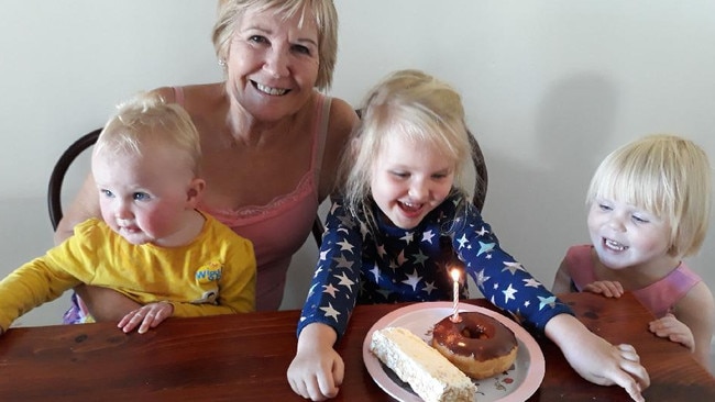 Marilyn Argall cant wait to see her grandchildren Harriet, 2, Bethany, 6, and Rosie, 3 when the border to Victoria reopens. Picture: Supplied