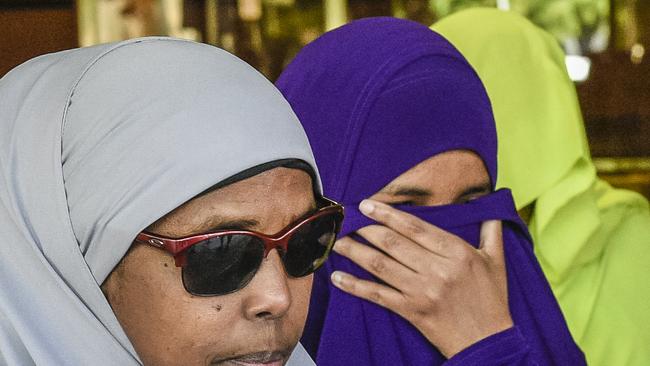 Zainab Abdirahman Khalif (centre, in purple) had her terror conviction overturned. Picture: AAP / Roy Vandervegt