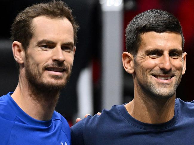 (FILES) (L-R) Britain's Andy Murray and Serbia's Novak Djokovic with (unseen) Switzerland's Roger Federer and Spain's Rafael Nadal pose during a Team Europe practice session ahead of the 2022 Laver Cup at the O2 Arena in London on September 22, 2022. Novak Djokovic announced on November 23, 2024, that his retired long-time rival Andy Murray is joining the 24-time Grand Slam-winning player's coaching team, starting at the Australian Open in January. (Photo by Glyn KIRK / AFP) / RESTRICTED TO EDITORIAL USE